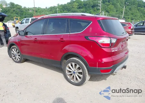 2017 Ford Escape Titanium z USA, uszkodzony, nr VIN 1FMCU9J99HUC41851